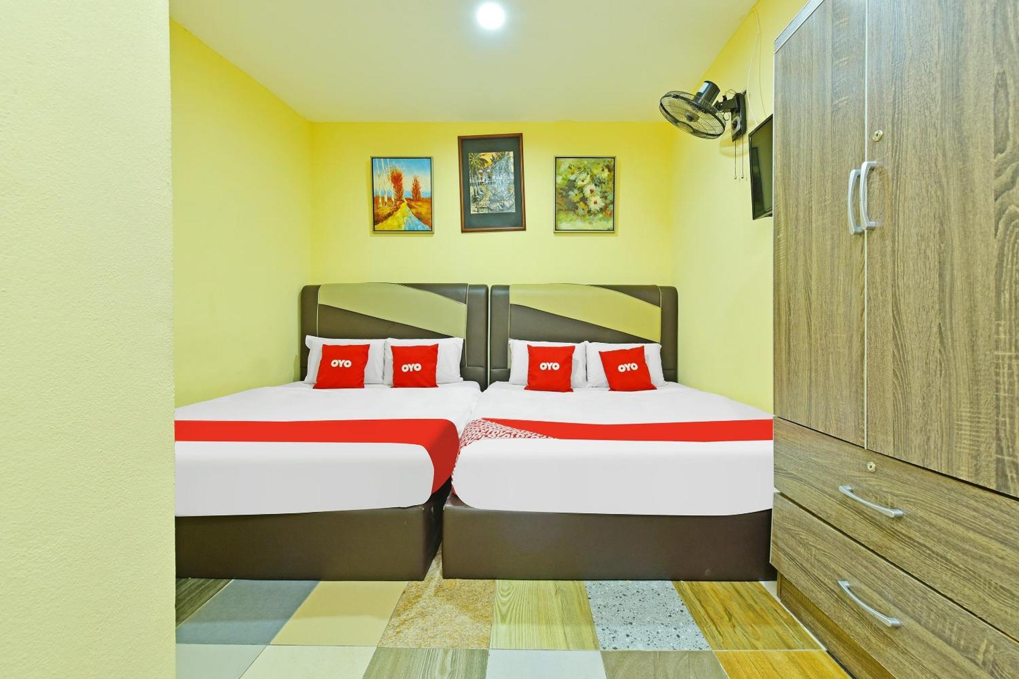 Oyo 873 Bamboo Inn Batu Ferringhi Esterno foto