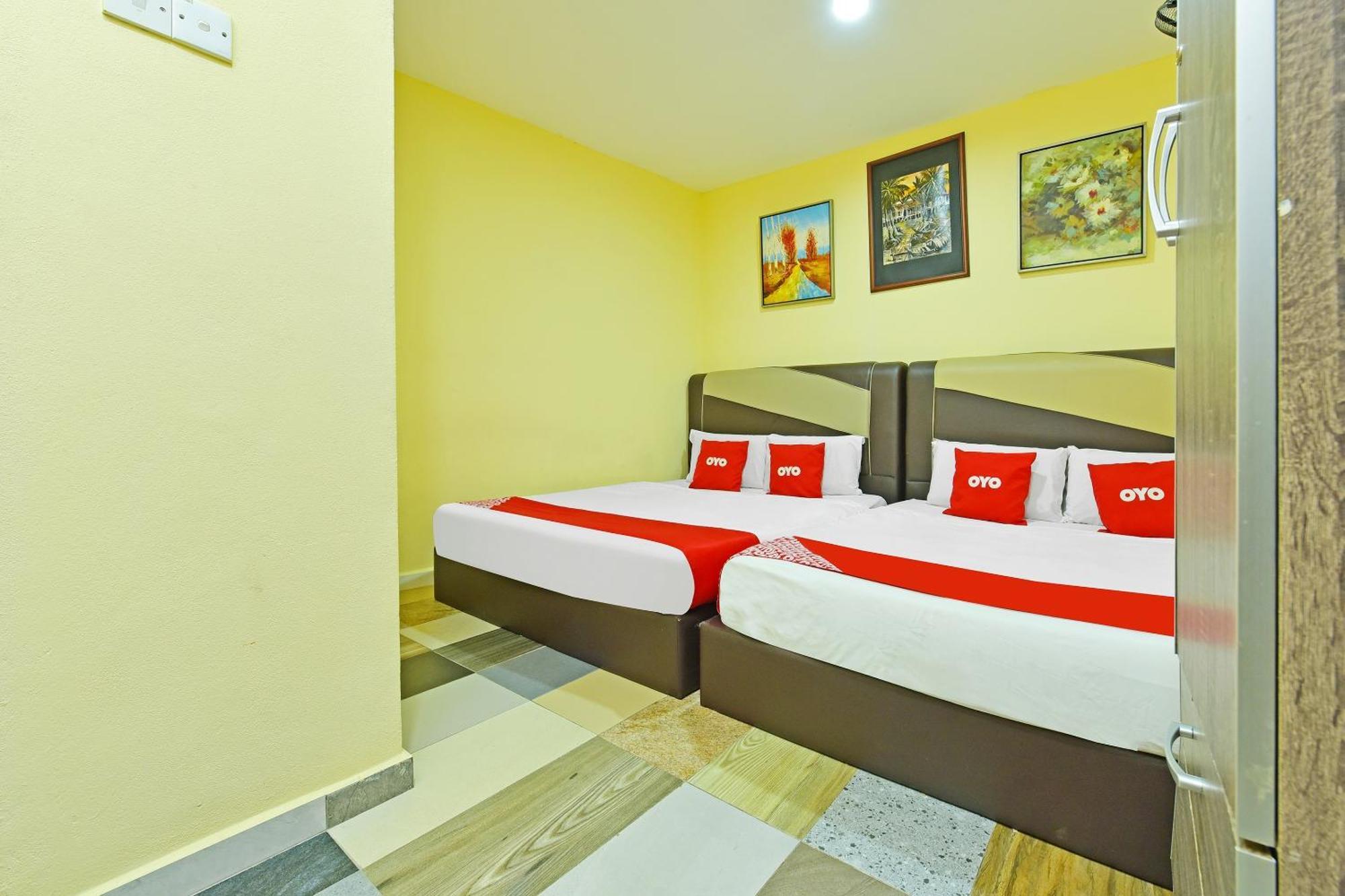Oyo 873 Bamboo Inn Batu Ferringhi Esterno foto